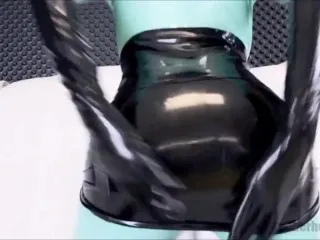 Black & Jade Latex Catsuit Porn Scene