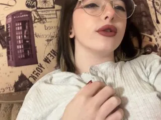 Horny Brunette Squeezes Big Boobs