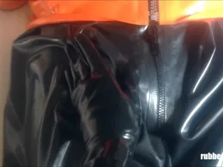 Latex-Clad Tease: Up-Close Cock Play