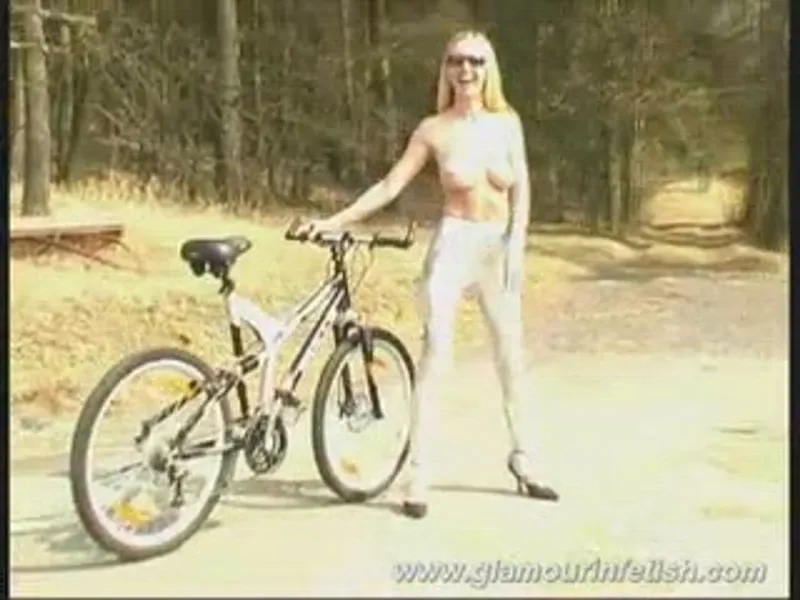 Big-titted Blonde Katherina rides bike, topless outdoor fun